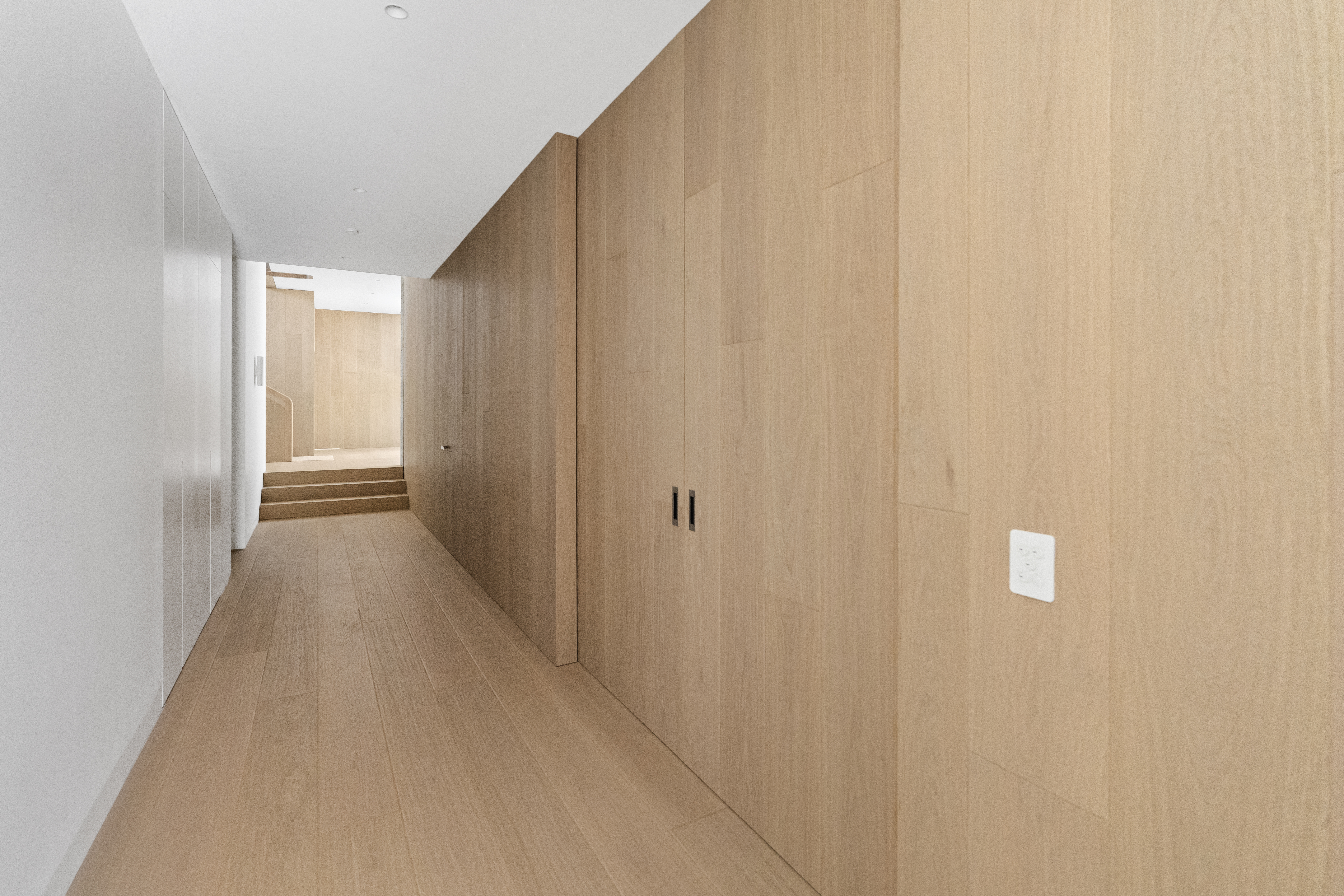Black Rock — corridor with timber panelling